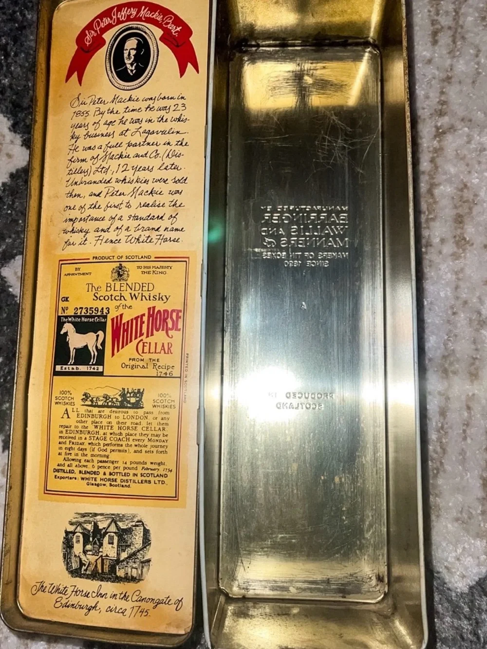 Vintage white horse Scottish whiskey tin. Good condition.